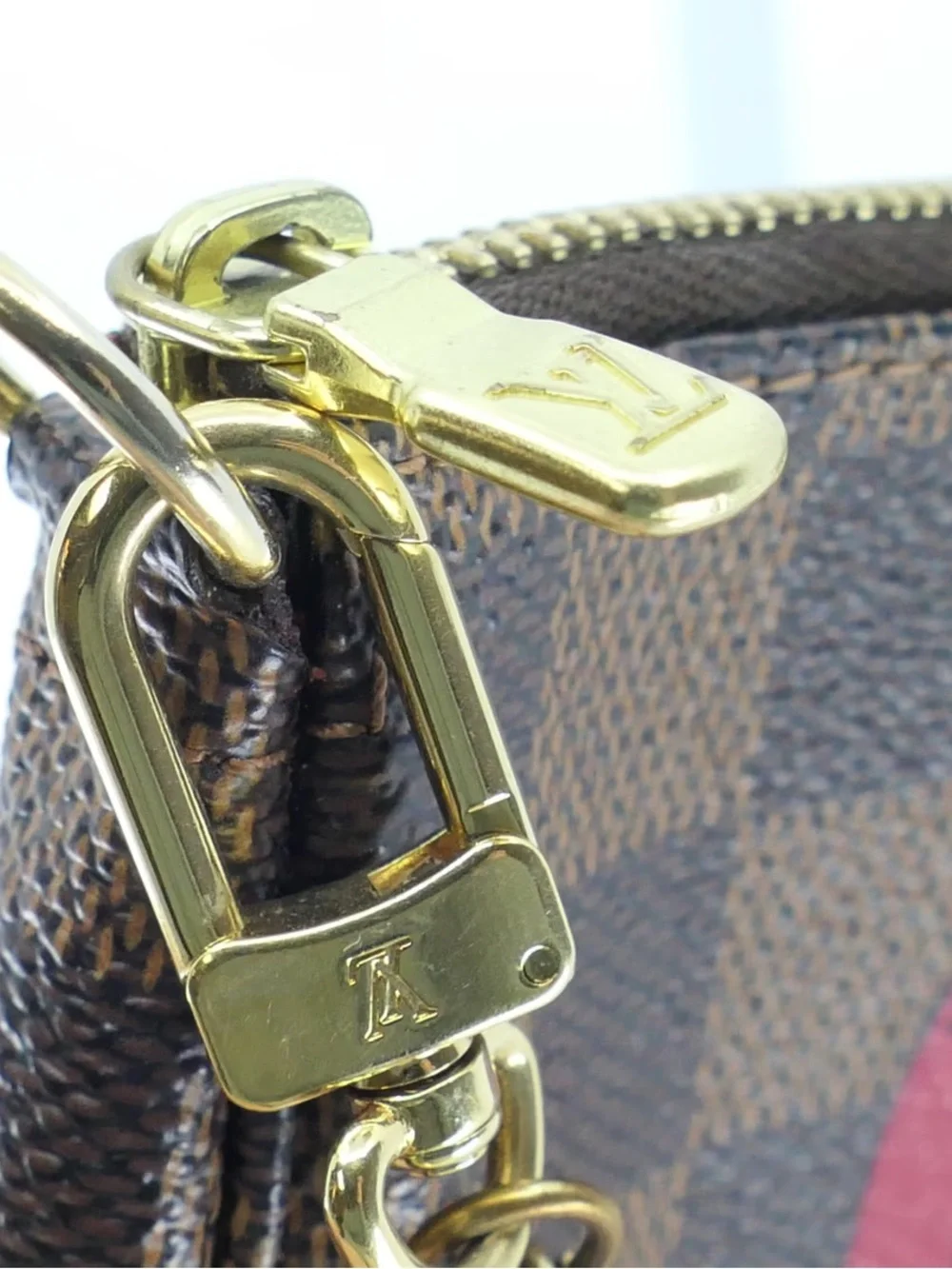 Louis Vuitton Brown Damier Ebene Mini Pochette Bag with “Trunks & Bags” Red Logo